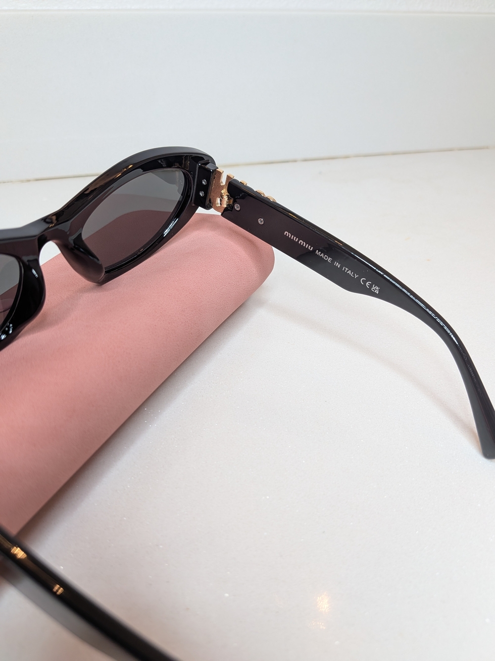 Miu Miu Women's Black Oval Cat Eye Sunglasses - Picture 11 of 13